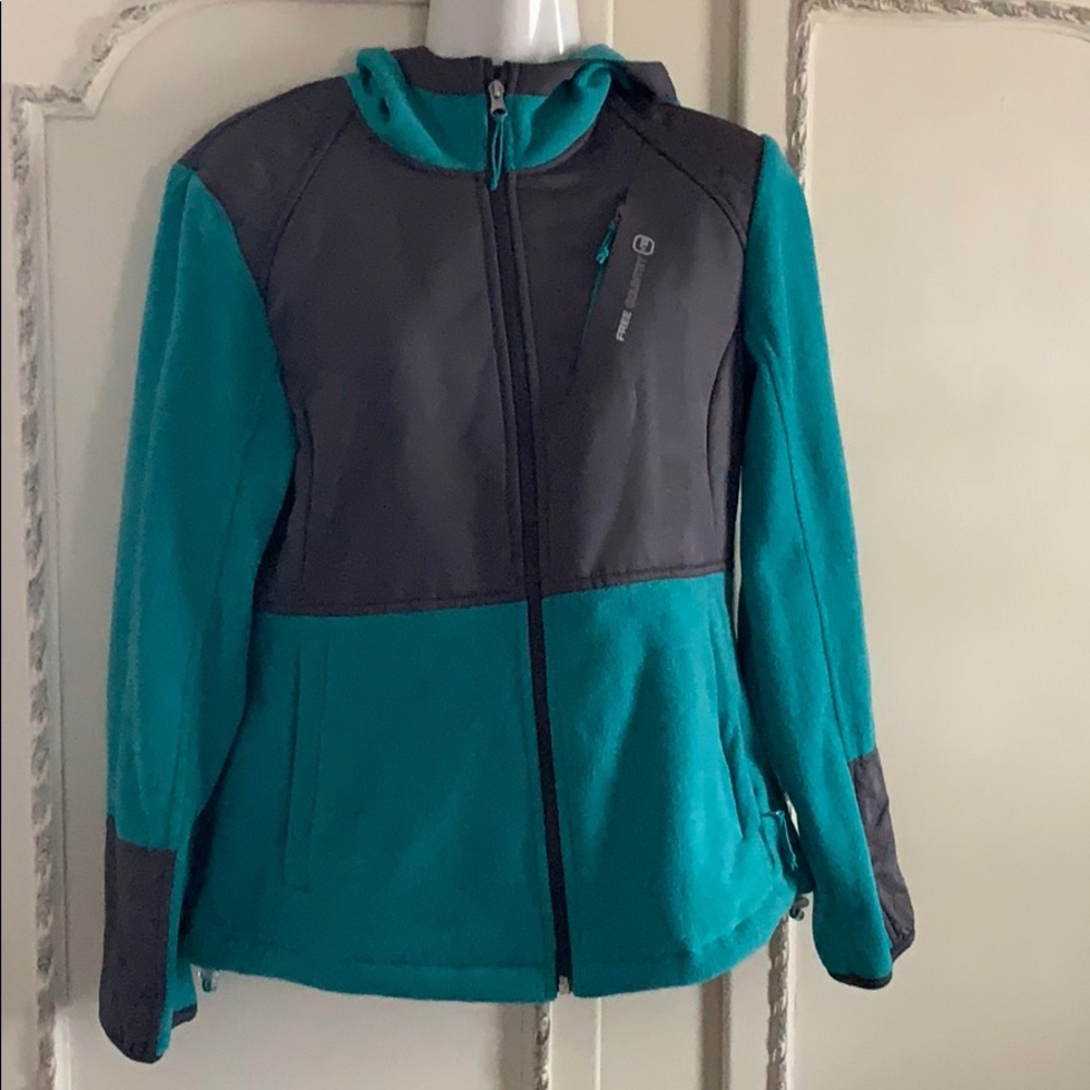 Woman’s zip up fleece size Medium